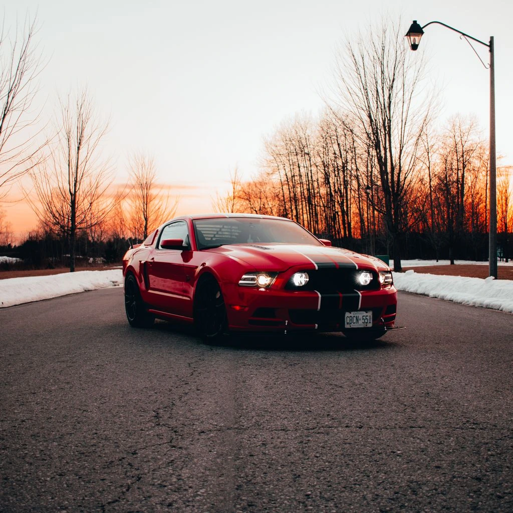 A 5.0L Coyote twin turbo kit on a steel plate
