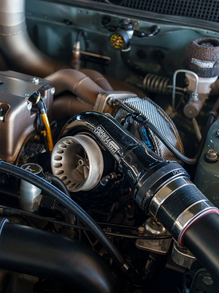 A Stage 3 turbocharger with billet wheel being mounted to a CNC manifold